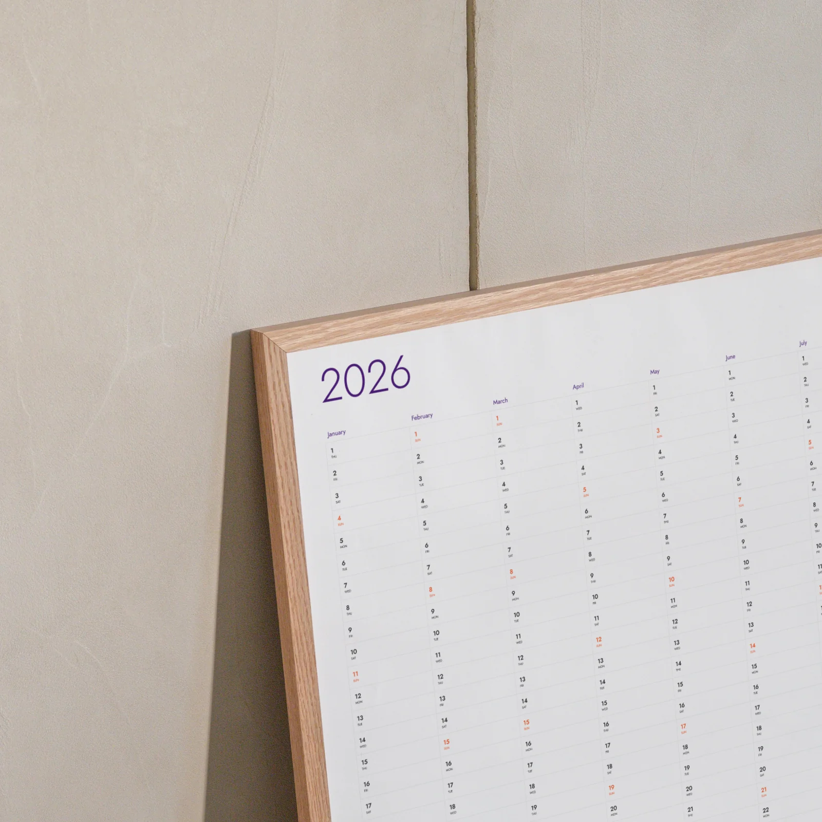 Vertical yearly wall planner — months flow left to right, year at a glance