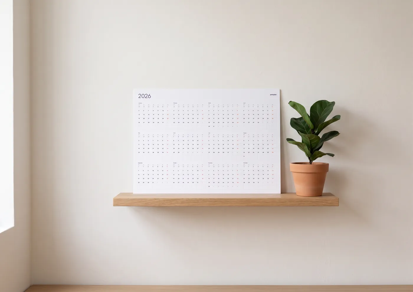 Minimalist Scandinavian room with a clean wall calendar