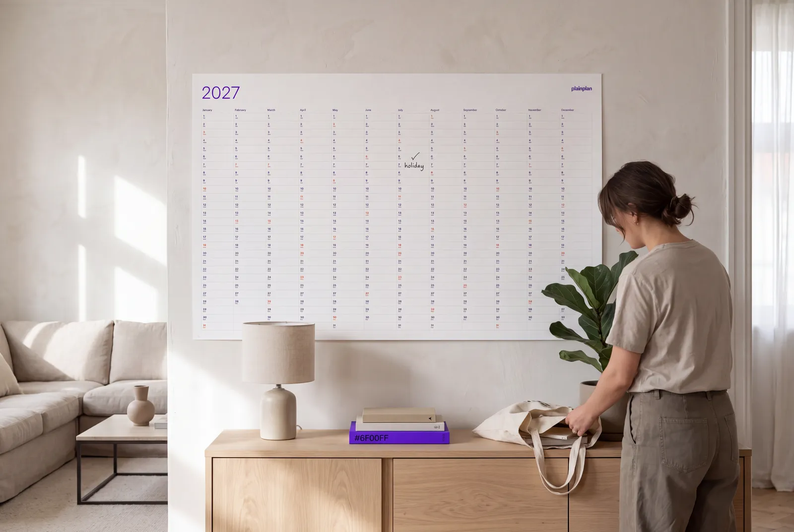 Minimalist plainplan 2027 wall planner in a calm living room