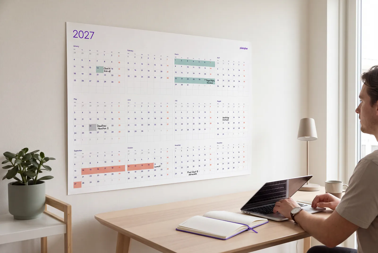 plainplan 2027 wall planner above a home office desk